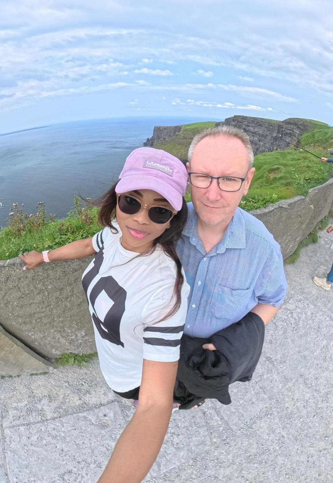Ola and her husband at the Cliffs of Moher